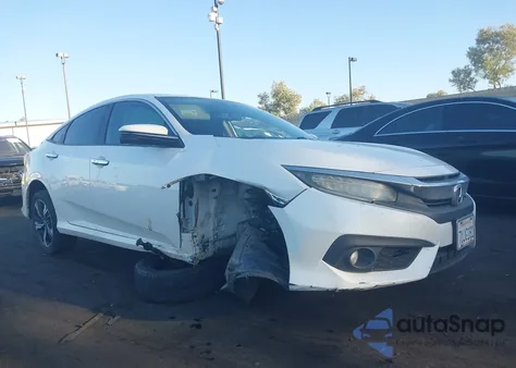 2017 Honda Civic Touring from USA, damaged, VIN 2HGFC1F9XHH658317
